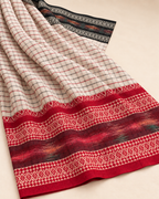 Yugma – White Checked Cotton Saree with Red and Black Borders